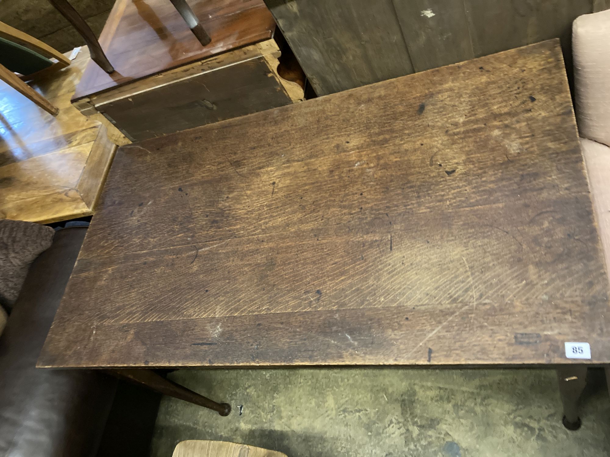 A late Victorian rectangular oak table, width 122cm, depth 69cm, height 74cm together with four church chairs